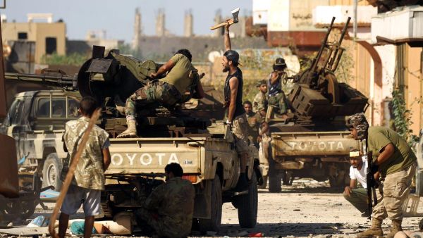 Members of the Libyan National Army (LNA), also known as the forces loyal to Marshal Khalifa Haftar, clash with jihadists in Benghazi. (AFP/File)