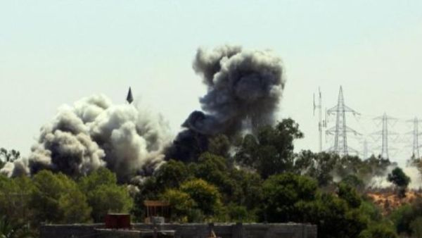 Smoke billows from Tajura, a suburb of Tripoli. (AFP/ File)