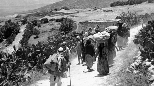 A picture dates to September 15, 1948 shows Palestinian refugees returning to their village after its surrender during the Arab war. (AFP)