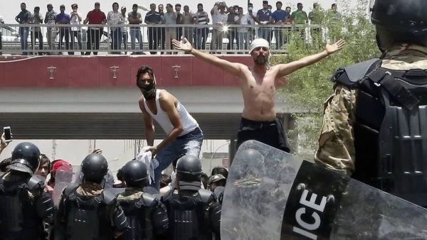 An image shared by social media users for confrontations in Basra city between protesters and police. (Twitter)