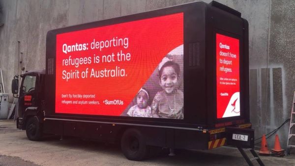 Billboards seen in several parts of Australia aim to put more pressure on the Qantas Airline to stop their involvement in deporting asylum seekers in Australia. (Twitter)