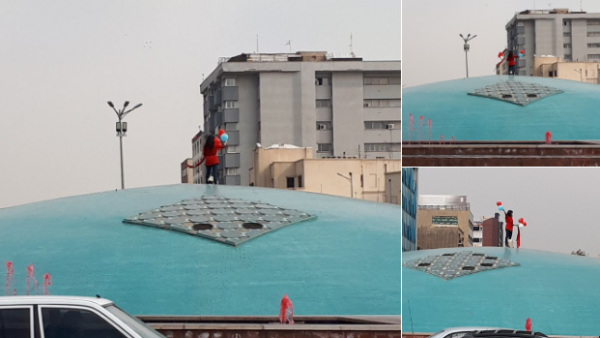 Iranian woman stood up and protested the compulsory laws in Enqelab Square in Tehran. (Socialmedia)