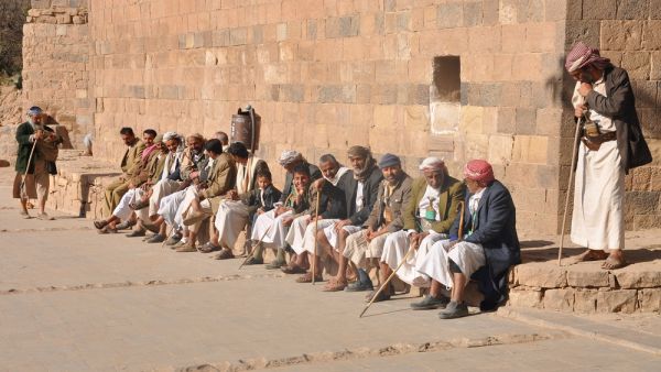 Men sit on the main square of Thula, Yemen (Shutterstock/File Photo)