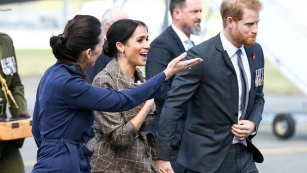 Britain’s Prince Harry and his wife Meghan with New Zealand’s Prime Minister Jacinda Ardern after arriving at the Wellington International Airport Military Terminal in Wellington. (Source: AFP) Britain’s Prince Harry and his wife Meghan with New Zealand’s Prime Minister Jacinda Ardern after arriving at the Wellington International Airport Military Terminal in Wellington. (Source: AFP)