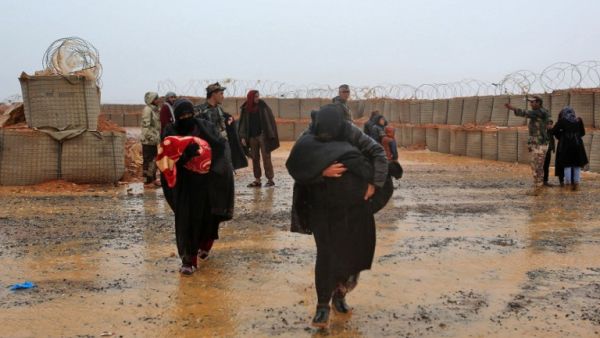 Syrian refugee patients from the makeshift Rukban camp, which lies in no-man's-land off the border between Syria and Jordan. (KHALIL MAZRAAWI / AFP)