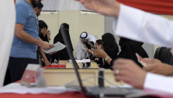 Bahraini voters cast their ballot for parliamentary election at a polling station in the Bahraini city of Al-Muharraq, north of Manama on November 24, 2018. (AFP)