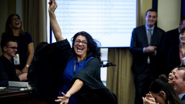 US Representative-elect Rashida Tlaib (D-MI) reacts to a good number during an office lottery for new members of Congress on Capitol Hill November 30, 2018 in Washington, DC. 
Brendan Smialowski / AFP US Representative-elect Rashida Tlaib (D-MI) reacts to a good number during an office lottery for new members of Congress on Capitol Hill November 30, 2018 in Washington, DC. 
Brendan Smialowski / AFP