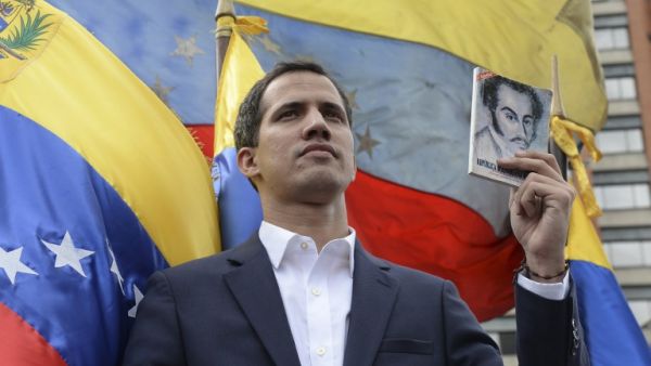 Venezuela's National Assembly head Juan Guaido declares himself the country's "acting president" during a mass opposition rally against leader Nicolas Maduro. (AFP/ File)