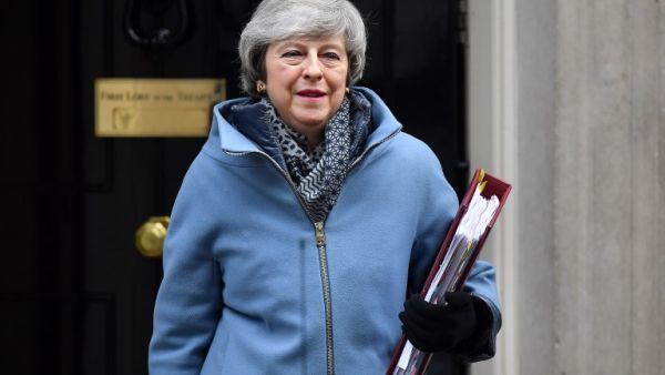 Britain's Prime Minister Theresa May leaves 10 Downing Street in London on February 13, 2019 ahead of the weekly Prime Ministers Questions session in the House of Commons. (AFP/ File)