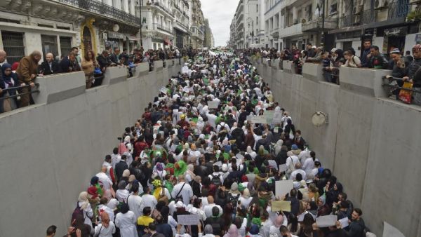 Algerians take part in a demonstration in the capital Algiers against President Abdelaziz Bouteflika on March 19, 2019. (RYAD KRAMDI / AFP)