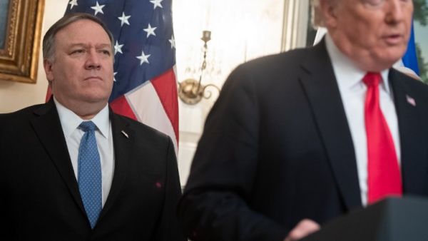 US President Donald Trump speaks alongside US Secretary of State Mike Pompeo (L) prior to signing a Proclamation on the Golan Heights in the Diplomatic Reception Room at the White House in Washington, DC, March 25, 2019. (AFP/ File Photo)