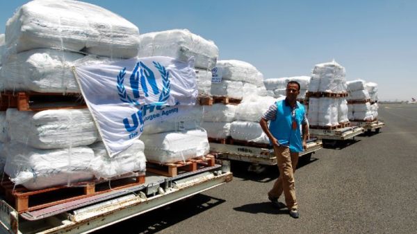 Emergency medical aid provided by United Nations High Commissioner for Refugees (UNHCR) is seen being unloaded at the international airport in Sanaa earlier this month. (AFP)