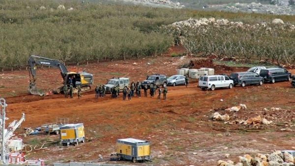 A position near the southern Lebanese village of Kfar Kila shows members of the Israeli military, excavators, trailers and other vehicles operating across on the other side of the border. (AFP)