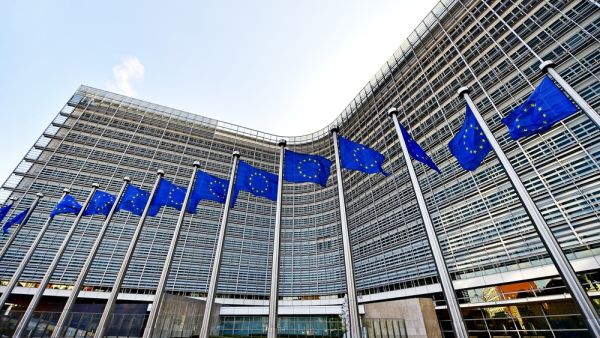 EU flags blown by wind in front of the European Commission Headquarters. (Shutterstock/ File)