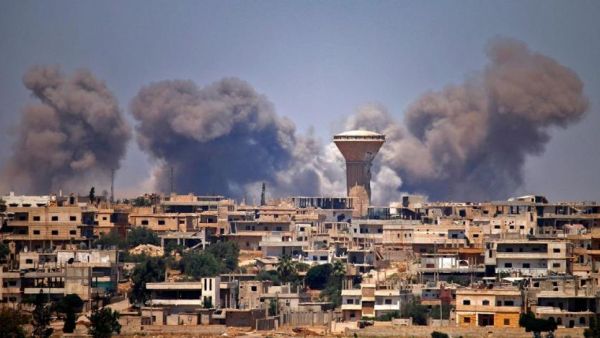 Smoke covers air after an air strike in Syria. (AFP)