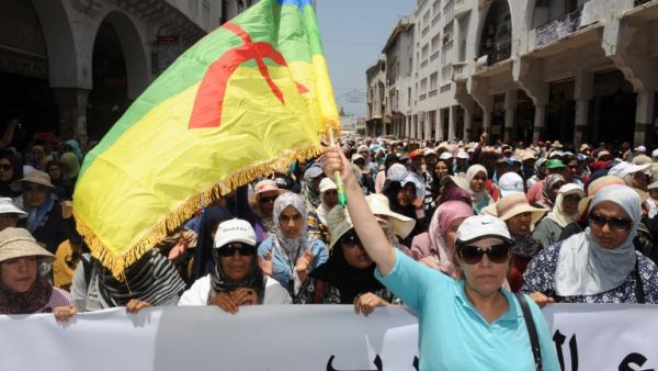 A Moroccan protester waves a flag of the Amazigh, Morocco's Berber community, during a demonstration in downtown Rabat on June 11, 2017, demanding that authorities release the leaders of a protest movement that has rocked the neglected northern Rif region for months. (Stringer/AFP)