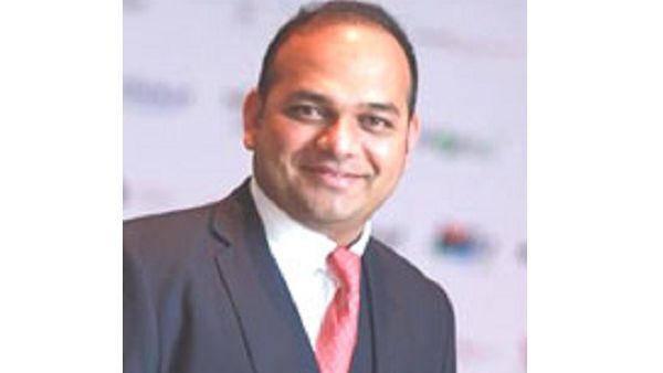 السيد سيد ان سي، المدير العام لشركة كيو ان ايه انترناشونال