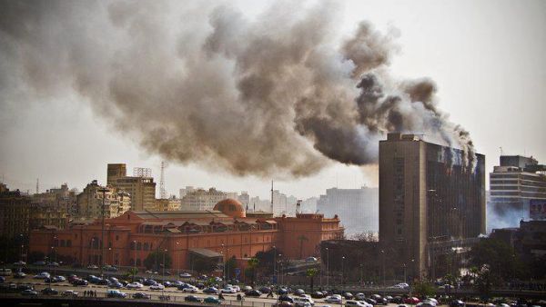 Former president Mubarak's headquarters are torched during the 2011 Revolution (Flikr/Darkroom Productions)