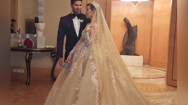 صور فستان زفاف إنجي قصابية المرصع بالألماس من بوتيك لابورجوازي صور فستان زفاف إنجي قصابية المرصع بالألماس من بوتيك لابورجوازي