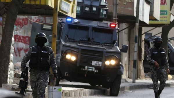 Jordanian security forces secure a street in the town of Irbid, 80km north of the capital Amman, near the border with Syria. (AFP/File)