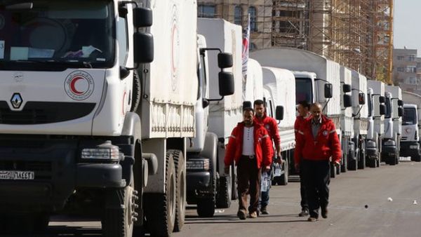 Aid convoys in Syria. (AFP/Louai Beshara)