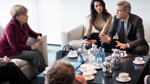 Amal Clooney and husband George meet Angela Merkel at the Federal Chancellery in Berlin. (Guido Bergmann, BPA , EPA)
