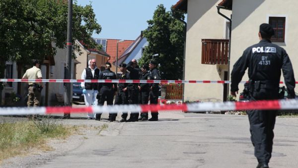 Policemen stand at a crime scene in Tiefenthal-Leutershausen near Ansbach, southern Germany. (AFP/File) 