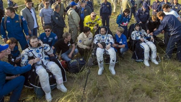 Mission control Houston called it a "bull's-eye landing," despite the capsule coming in on its side instead of an upright position. (AFP/File)