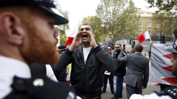 Wife and baby of Bahraini rights activist on 'travel ban' after London protest. (AFP/File)