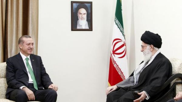 A handout picture released by the official website of Iran’s supreme leader, Ayatollah Ali Khamenei, shows him, right, meeting with Turkish Prime Minister Recep Tayyip Erdoğan in Tehran, Iran, on January 29, 2014. (AFP/HO/Iranian Supreme Leader’s Website)