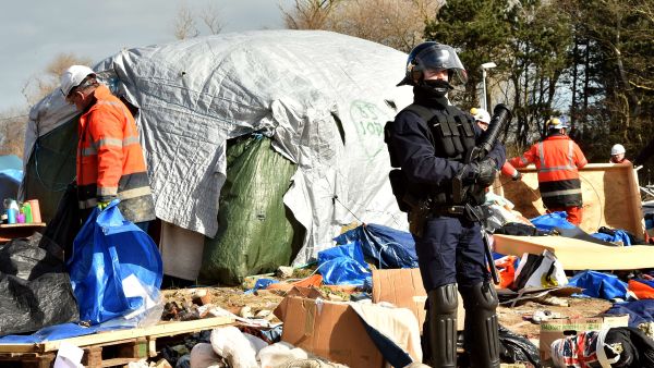 Calais Jungle demolition begins as riot police move into migrant camp. (AFP/File)
