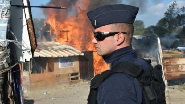 Officials expect the operation to become more difficult over the course of the week, after those who volunteered to leave are transported to accommodation centres and only those reluctant to give up on reaching Britain remain the camp. (AFP/File)