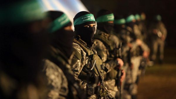Palestinian members of the Ezzedine al-Qassam Brigades, the armed wing of the Hamas movement, take part in a gathering on January 31. (AFP/File)