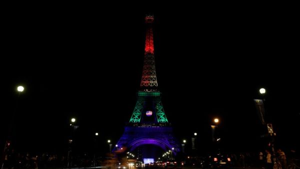 Eiffel Tower in Paris illuminated in rainbow colours to pay homage to the victims. (Thomas Samson/AFP)