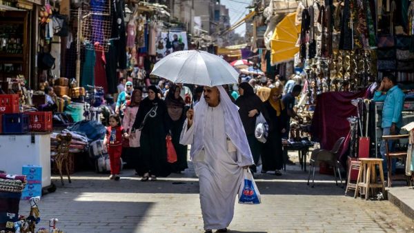 An Egyptian man walks down the street at the Khan al-Khalili market in Cairo on May 20, 2016. (AFP/File)