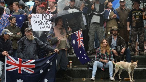 Eight detention center guards (not pictured) were photographed at Reclaim Australia – a rally against “Islamization” of Australia. (AFP/File)