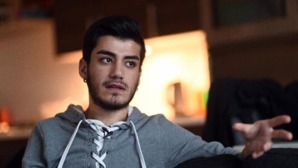 Omar, a 20-year-old Syrian gay refugee, speaks about his journey and about abuses against gay migrants by fellow travellers, during an interview with AFP in Aalsmeer, the Netherlands. (AFP/Emmanuel Dunand)