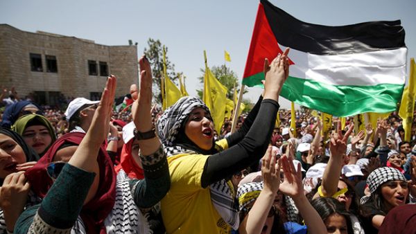 A number of Palestinian activists have criticized the two-state solution as unsustainable and unlikely to bring durable peace, proposing instead a binational state with equal rights for Israelis and Palestinians. (AFP/File)