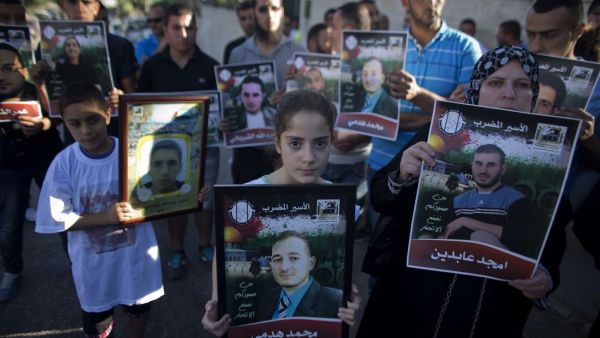 According to prisoners rights group Addameer, 7,000 Palestinians were being held in Israeli prisons as of August. (AFP/File)