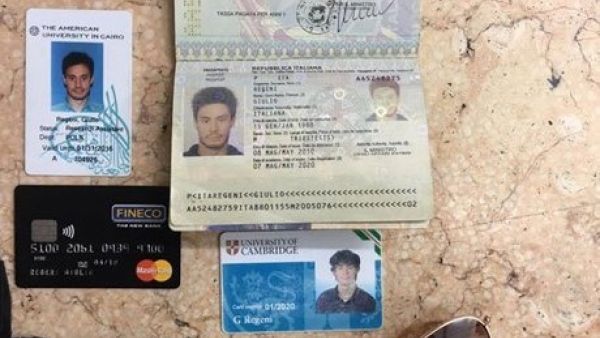 A file photo released by the Egyptian Ministry of Interior on Mar. 24, 2016, showing personal belongings of killed Italian graduate student Giulio Regeni, including his passport, are displayed. (Twitter)