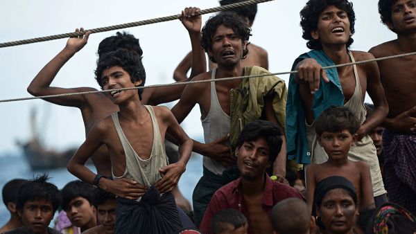This file photo shows the desperate cries of Rohingya and Bangladeshi refugees adrift on boat as they were turned away from Thailand in September 2015. (AFP/Christophe Archambault)