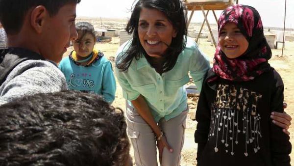 Nikki Haley on a separate trip to meet Syrian refugees at Jordan's Zaatari camp last May (AFP)