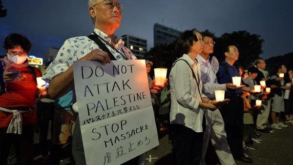 A solidarity protest with #Gaza, Tokyo 2014 (Photos: AFP - Kazuhiro Nogi)  A solidarity protest with #Gaza, Tokyo 2014 (Photos: AFP - Kazuhiro Nogi)