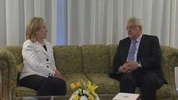 عباس وكلينتون