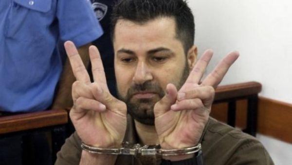 الناشط الفلسطيني عبد الله ابو رحمة اثناء محاكمته امام محكمة عسكرية اسرائيلية
