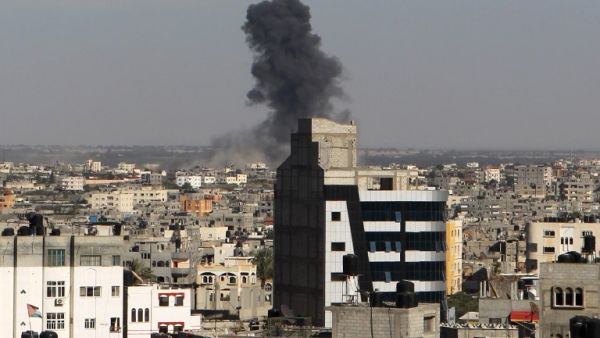 Smoke rises following an Israeli air strike in Rafah, in the southern Gaza Strip, on May 5, 2016. (AFP/Said Khatib)