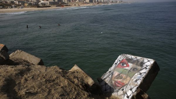 A general view taken on May 16, 2016 shows graffiti in Gaza City commemorating the "Nakba" or "catastrophe" in Arabic in reference to the establishment of Israel 68 years ago. (AFP/Mohammed Abed)