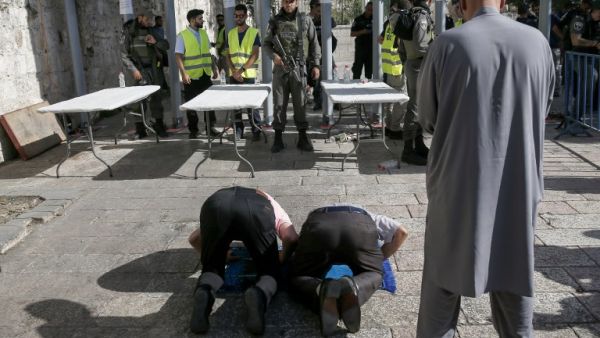 Security measures added by Israel to Al-Aqsa last week sparked Palestinian rage (AFP)