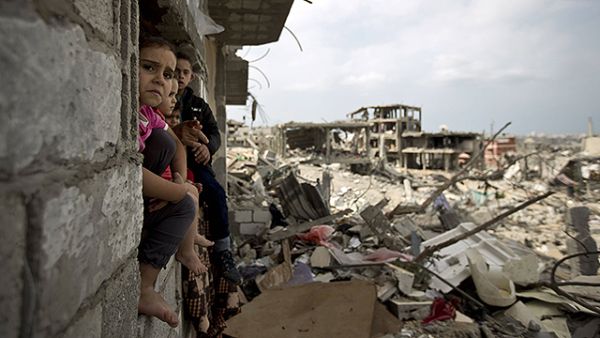 The last three Israeli operations – Operation Protective Edge, Operation Pillar of Defense and Operation Cast Lead – have led to the destruction of over 80,000 structures in Gaza. [AFP]