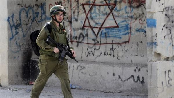 An Israeli soldier on patrol in the southern West Bank city of Hebron. (AFP/File)
